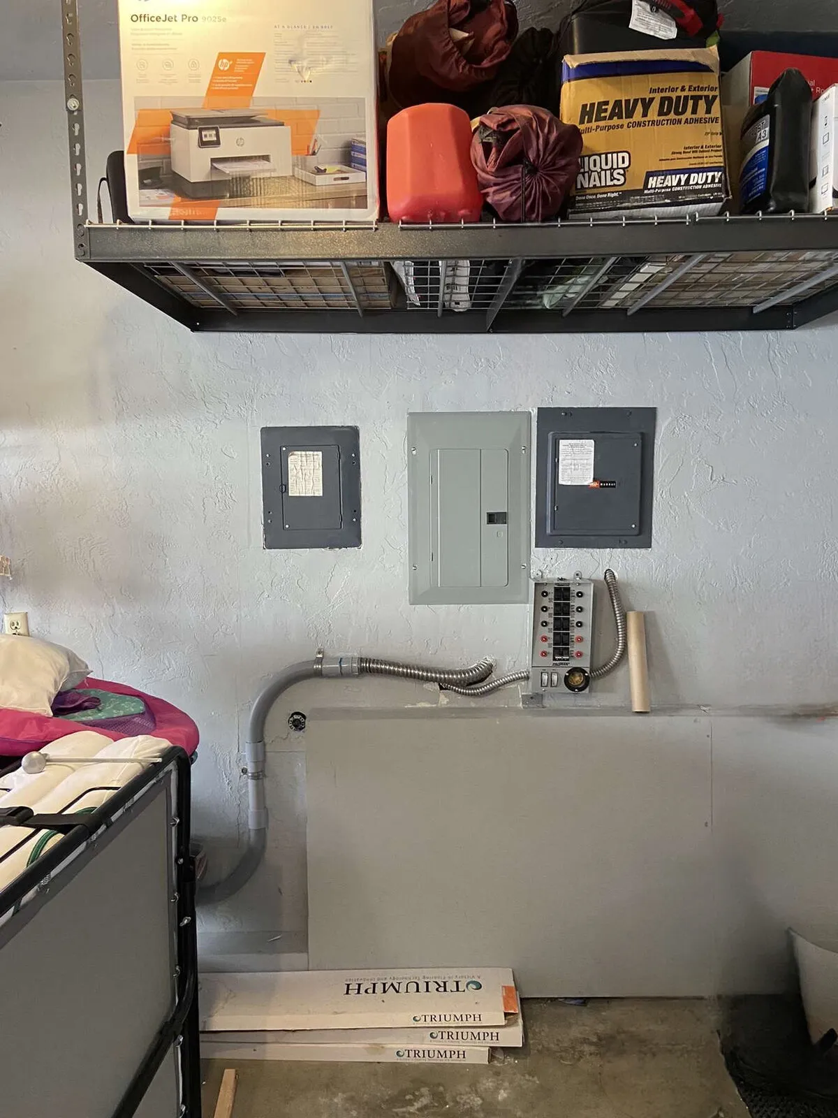 Finished drywall patch around electrical box with hand-matched texture