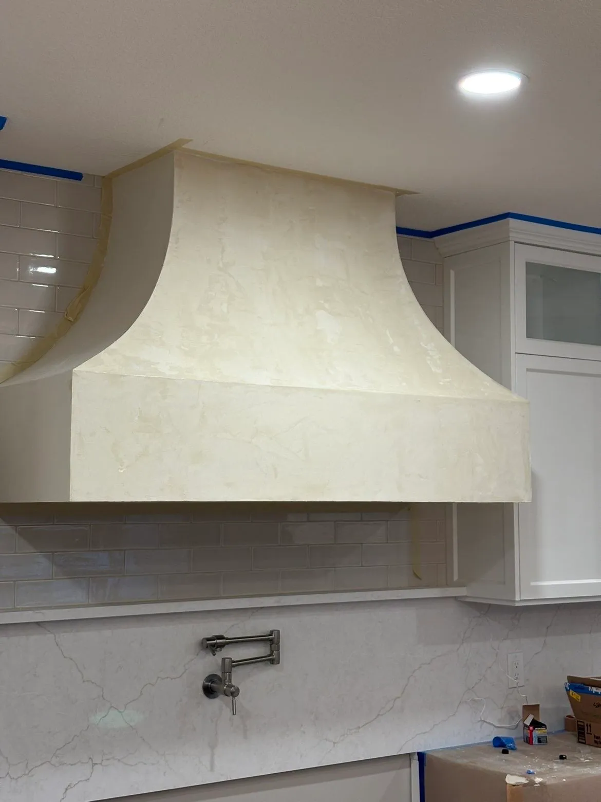 Custom kitchen hood with Fresco Harmony Lone Coffee hand-applied finish
