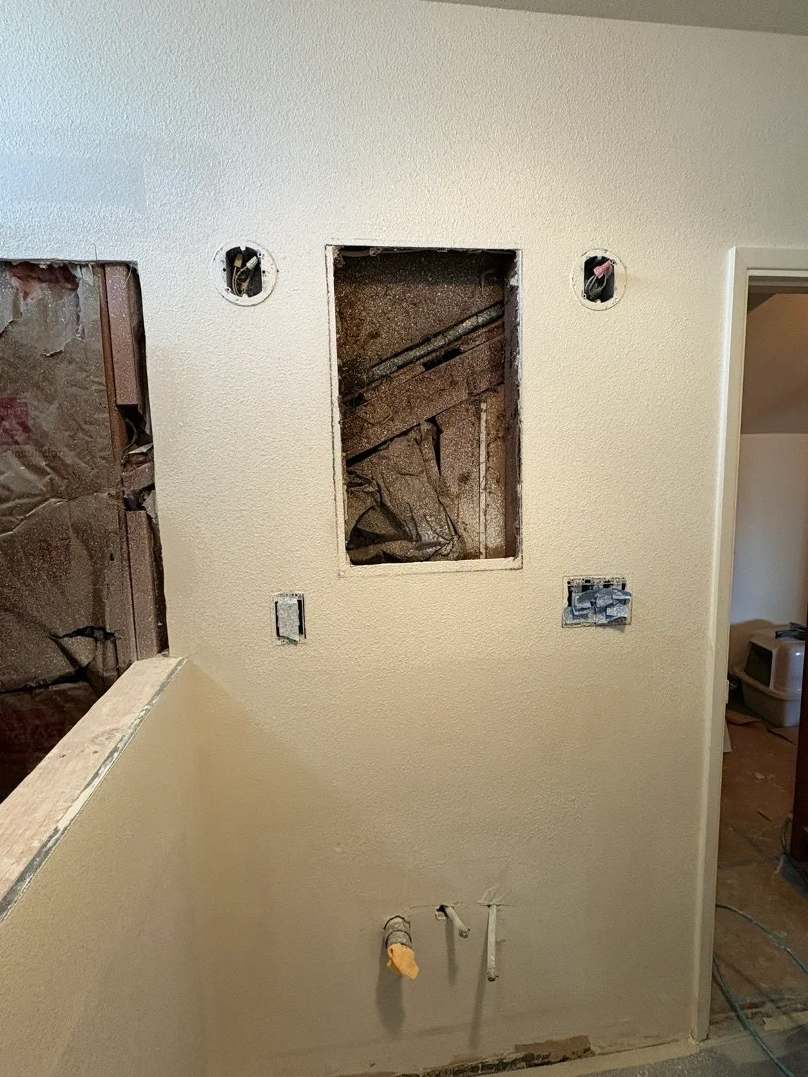 Bathroom wall and ceiling work during full remodel