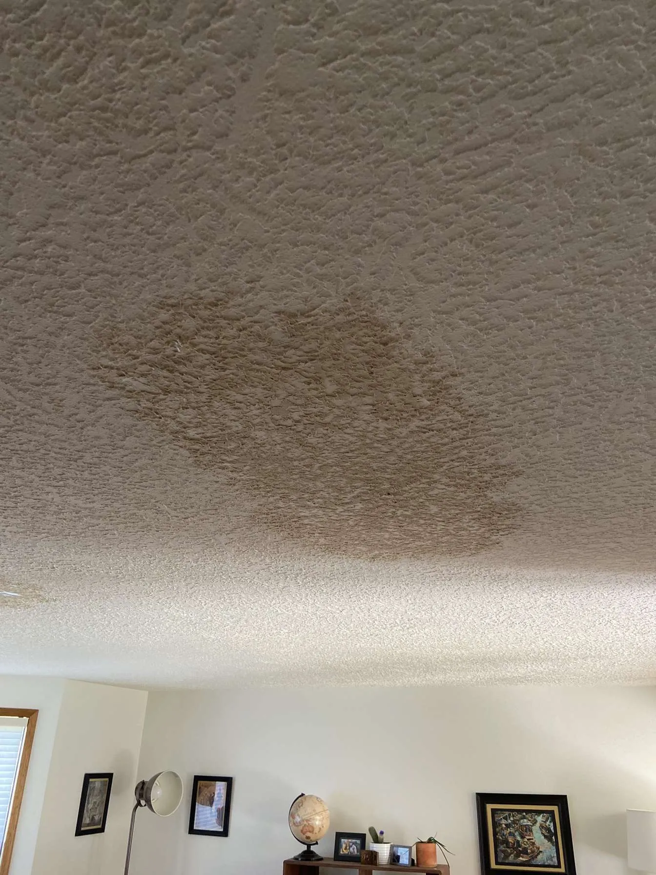 Ceiling drywall installation in residential kitchen area