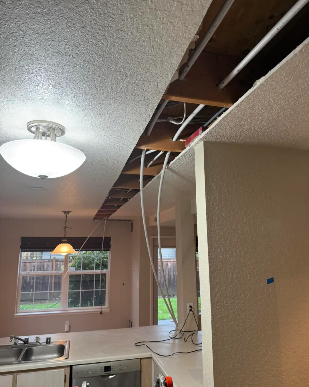 Kitchen ceiling torn open after repipe